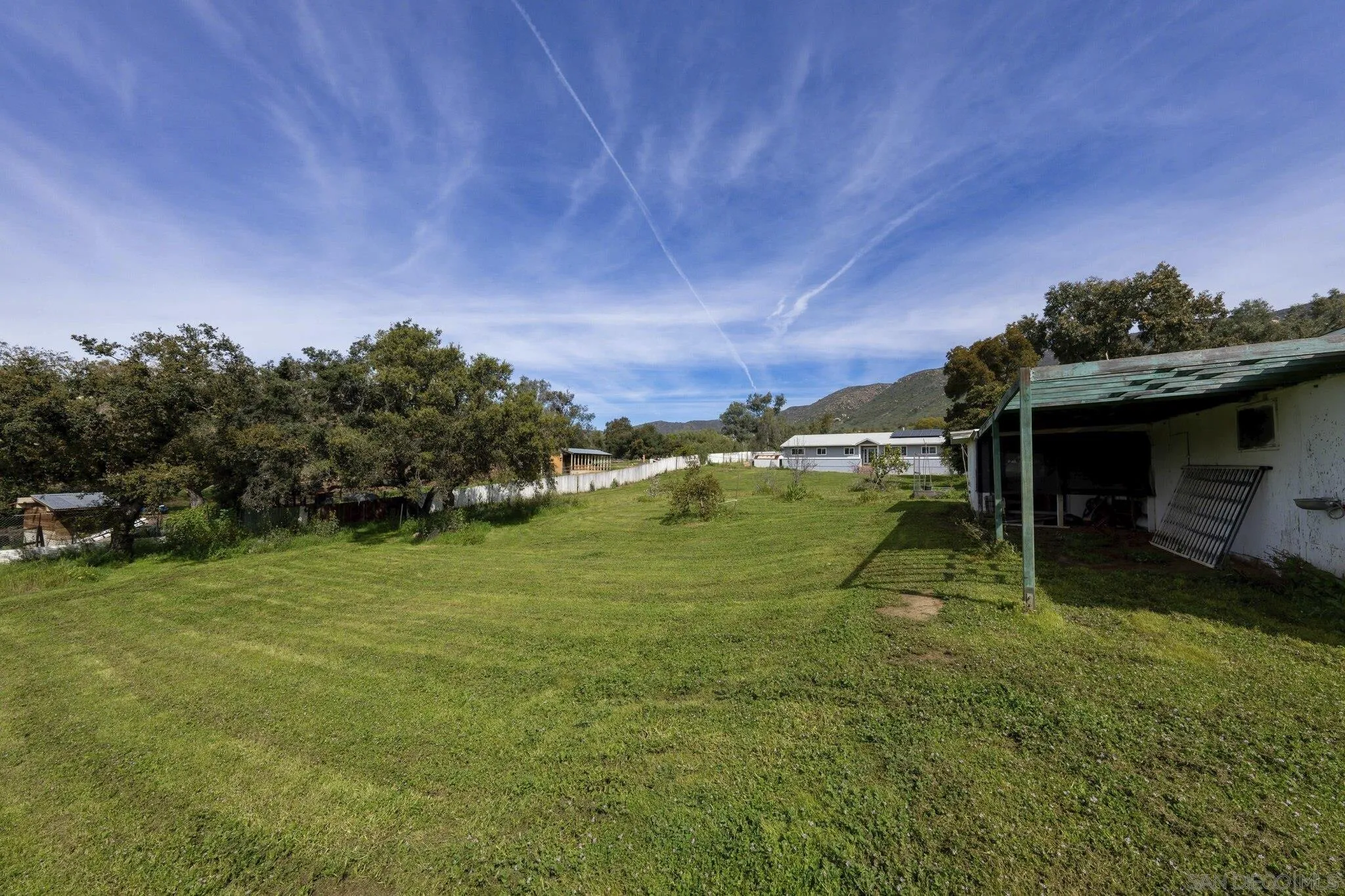 3232 Monterey Crest Drive Jamul, CA 91935 - Photo 50 of 52 a backyard of a house with lots of green space
