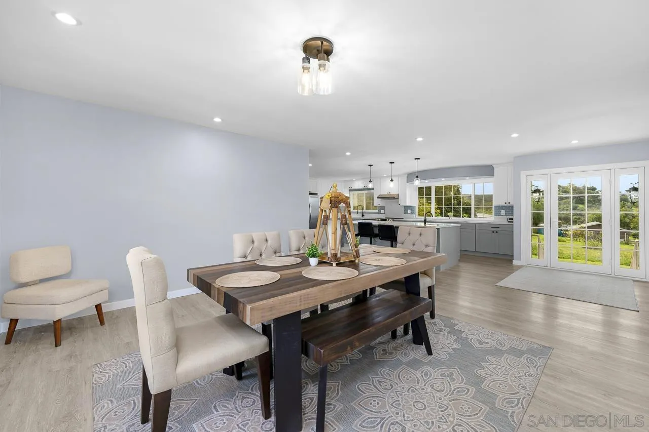3232 Monterey Crest Drive Jamul, CA 91935 - Photo 10 of 52 a view of a dining room with furniture and wooden floor