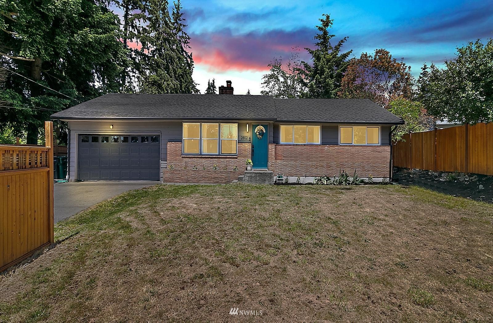 front view of a house with a dry yard