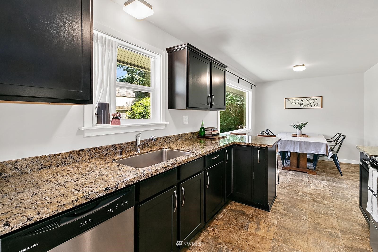 2802 South 304th Street Federal Way, WA 98003 - Photo 12 of 24 a kitchen with a sink and a window