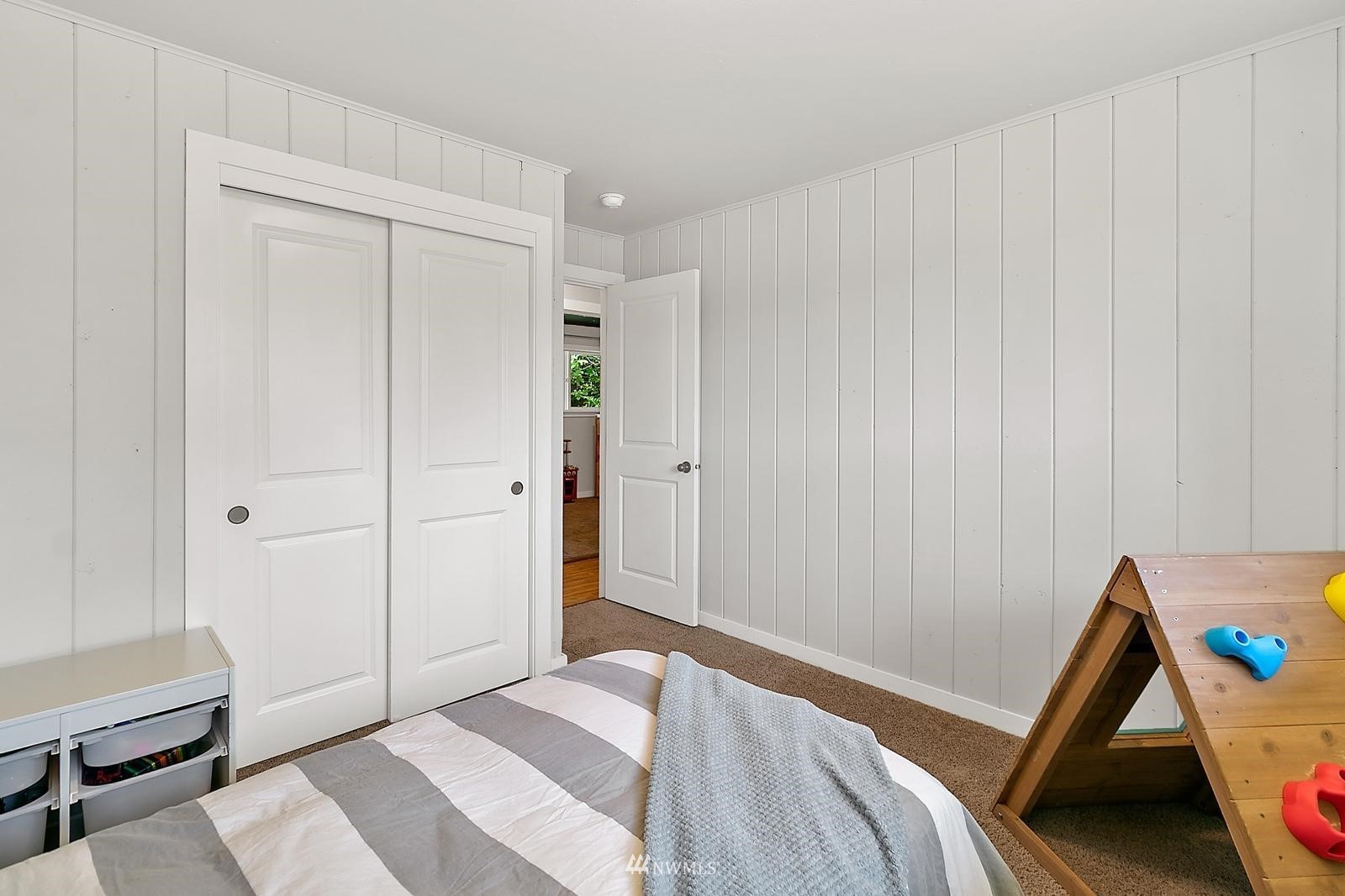 2802 South 304th Street Federal Way, WA 98003 - Photo 16 of 24 a bedroom with a bed and a chair