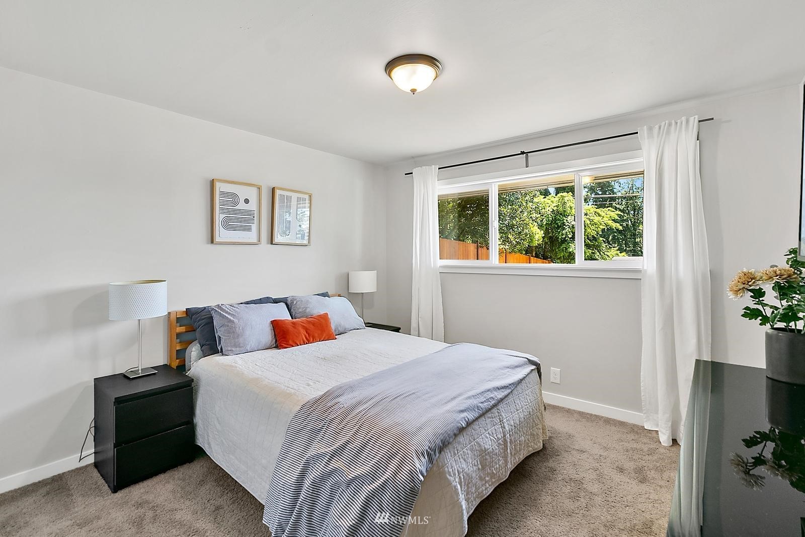 2802 South 304th Street Federal Way, WA 98003 - Photo 17 of 24 a bedroom with bed and a window
