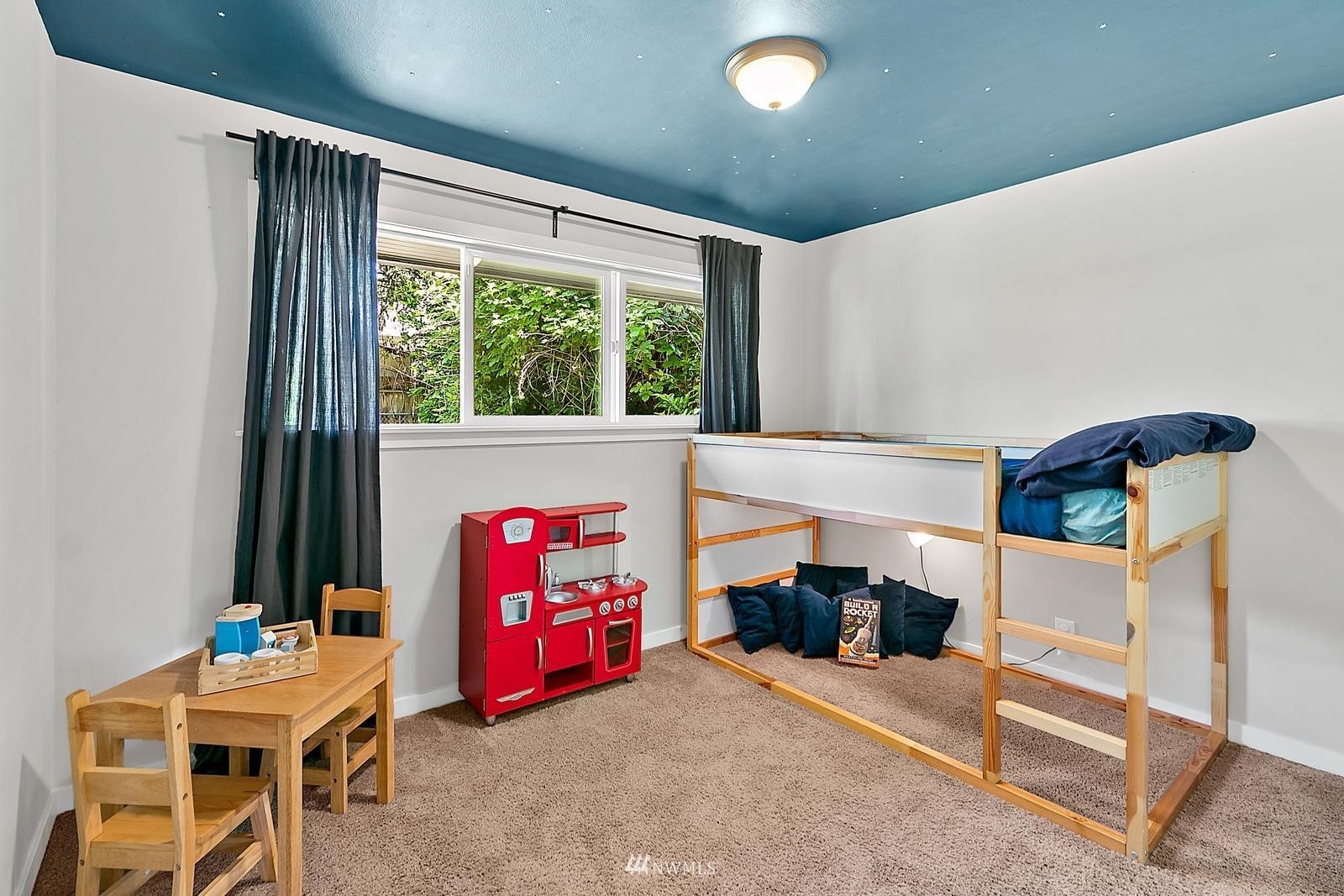 2802 South 304th Street Federal Way, WA 98003 - Photo 19 of 24 a bedroom with furniture and a window