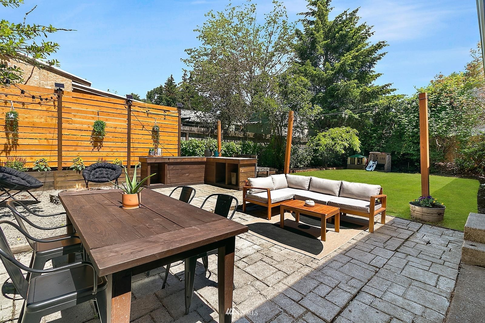 2802 South 304th Street Federal Way, WA 98003 - Photo 20 of 24 a backyard of a house with outdoor seating