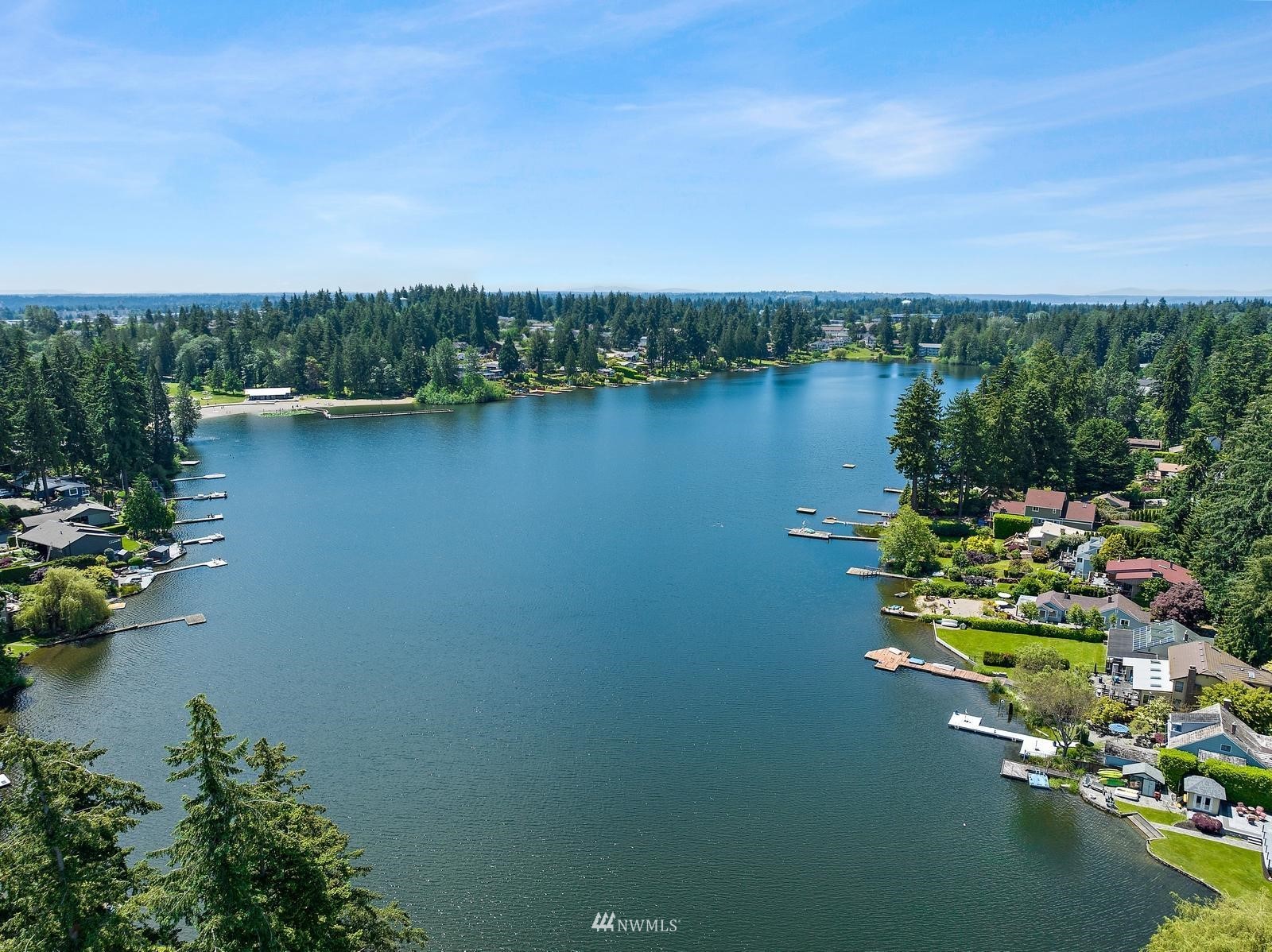 2802 South 304th Street Federal Way, WA 98003 - Photo 2 of 24 an aerial view of a house with a lake view