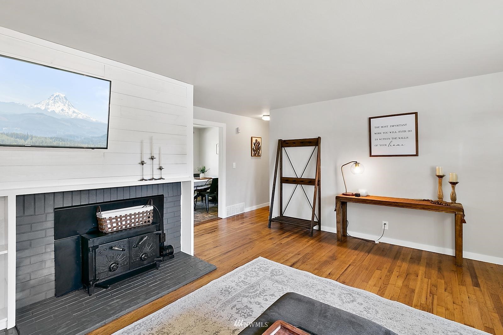 2802 South 304th Street Federal Way, WA 98003 - Photo 6 of 24 a living room with furniture and a wooden floor