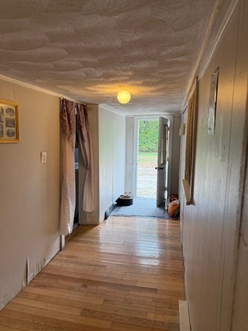 124 Hazen Road Shirley, MA 01464 - Photo 11 of 31 a view of empty room with wooden floor and window