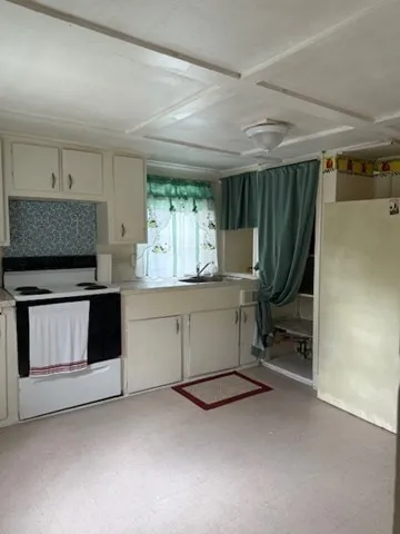 a room with furniture and a fireplace