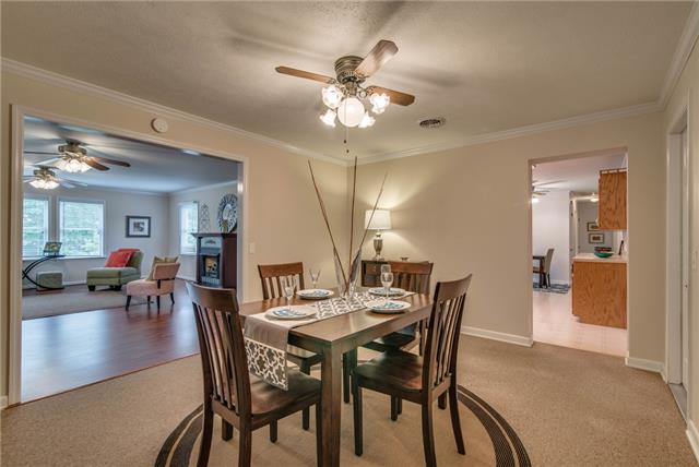 1394 Pomona Road Dickson, TN 37055 - Photo 3 of 20 a view of a dining room with furniture and wooden floor