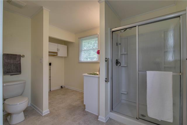 1394 Pomona Road Dickson, TN 37055 - Photo 8 of 20 a bathroom with a shower and a toilet