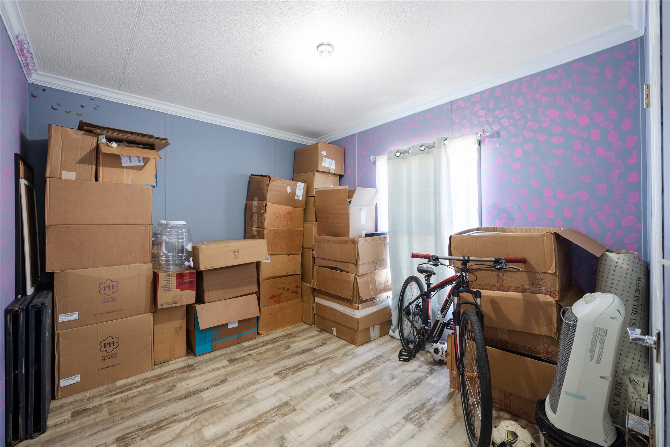 513 Duchess Pass Kyle, TX 78640 - Photo 10 of 16 a bed room with furniture and wooden floor