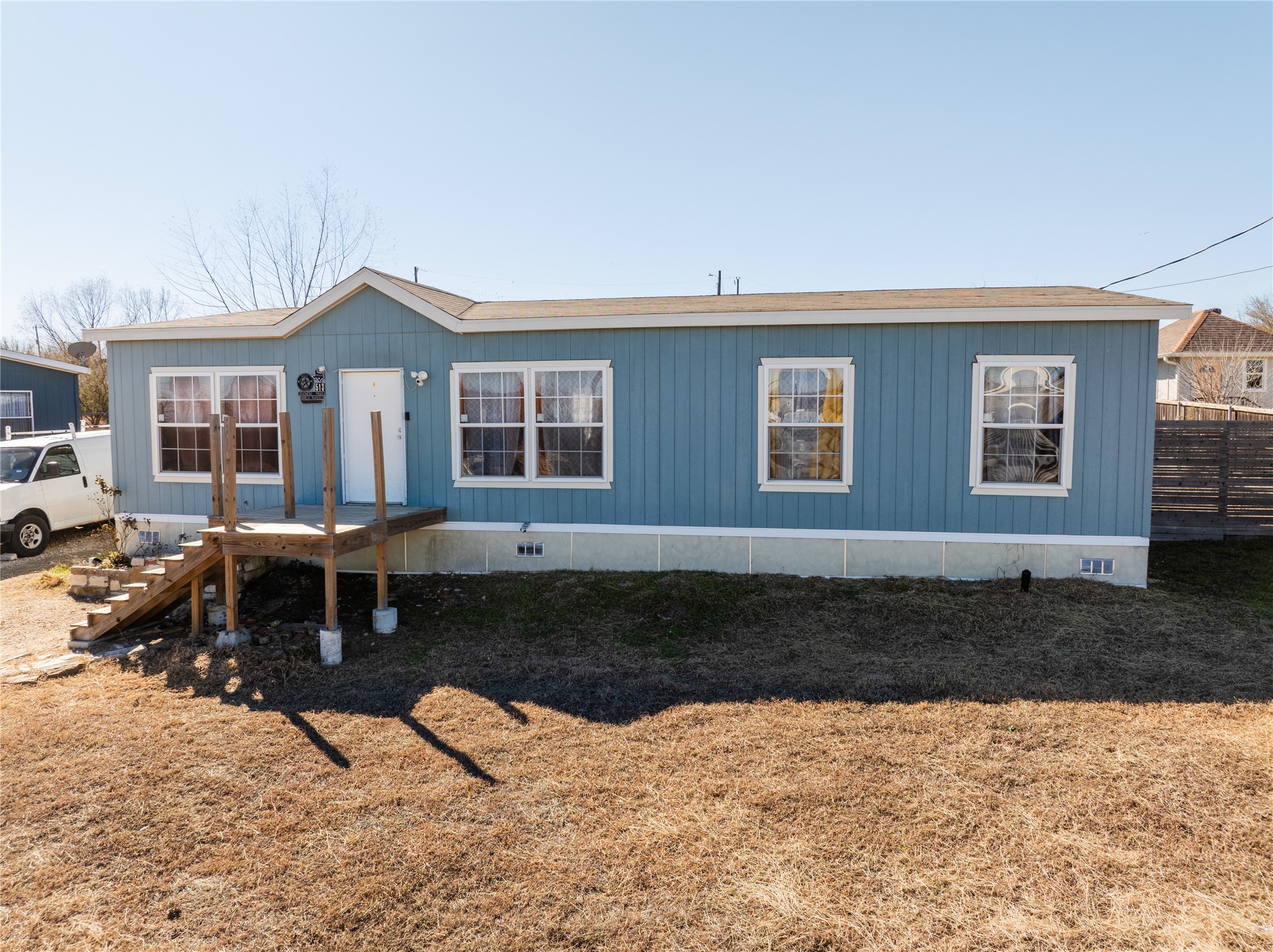 513 Duchess Pass Kyle, TX 78640 - Photo 13 of 16 a house view with a backyard space