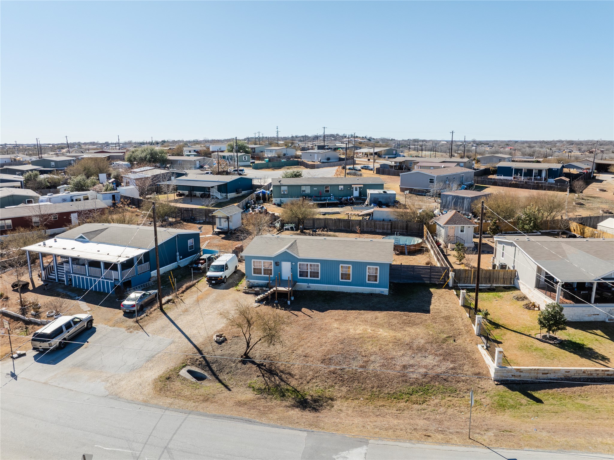 513 Duchess Pass Kyle, TX 78640 - Photo 15 of 16 an aerial view of residential houses with outdoor space