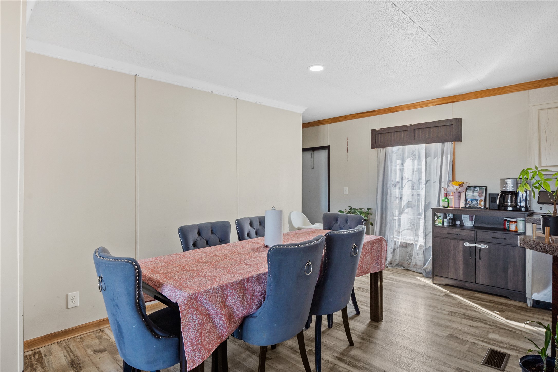513 Duchess Pass Kyle, TX 78640 - Photo 3 of 16 a view of a dining room with furniture