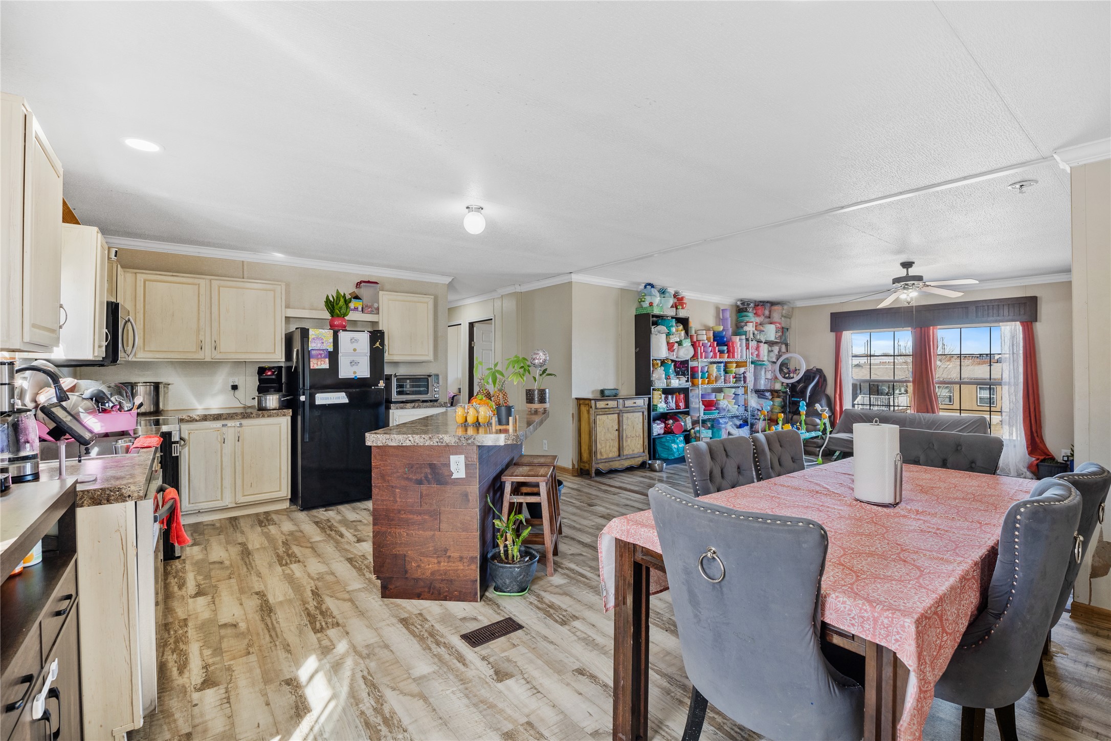 513 Duchess Pass Kyle, TX 78640 - Photo 6 of 16 a living room with furniture and kitchen view
