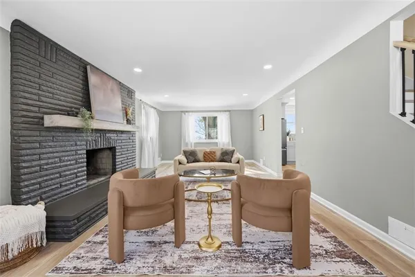 a view of a livingroom with furniture