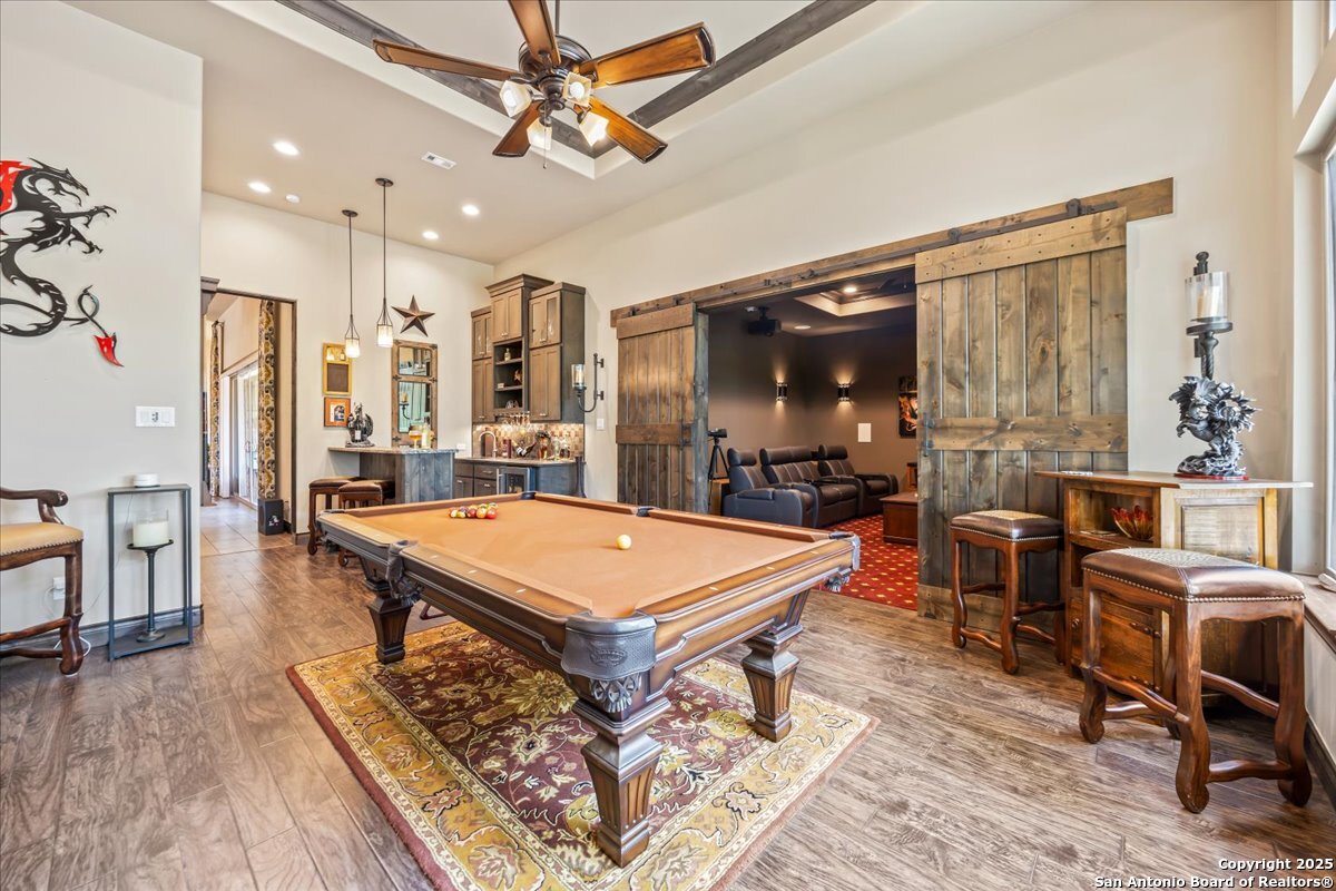 742 Pacific Spring Branch, TX 78070 - Photo 24 of 52 a room with furniture pool table flat screen tv and a large window