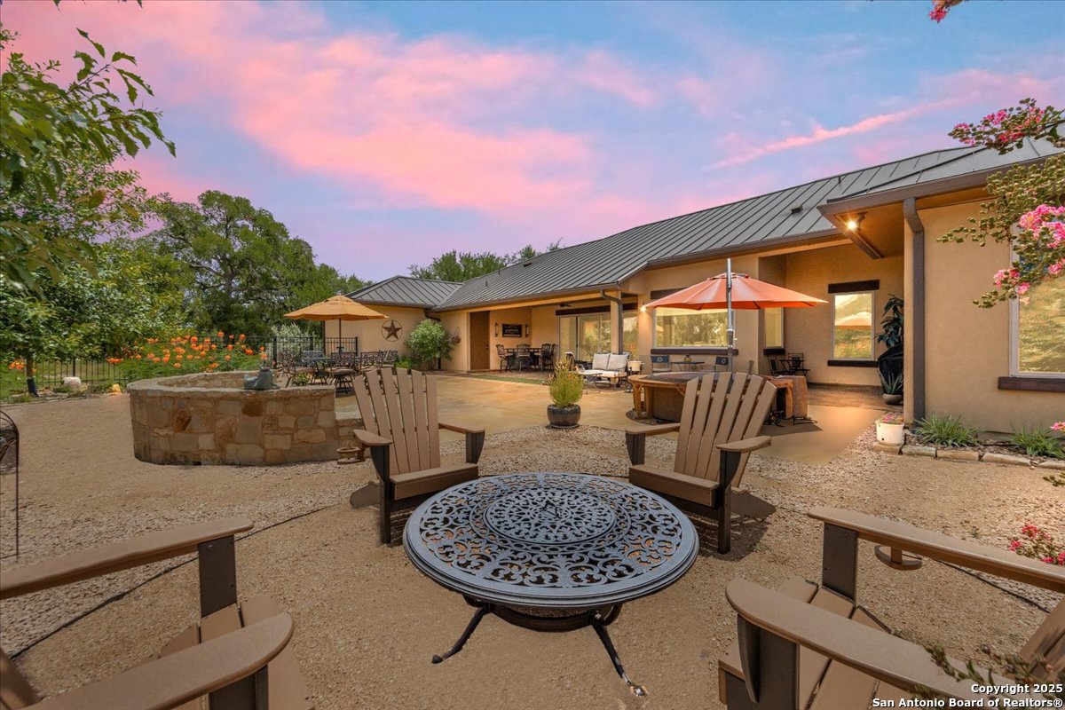 742 Pacific Spring Branch, TX 78070 - Photo 32 of 52 a view of a house with backyard porch and patio