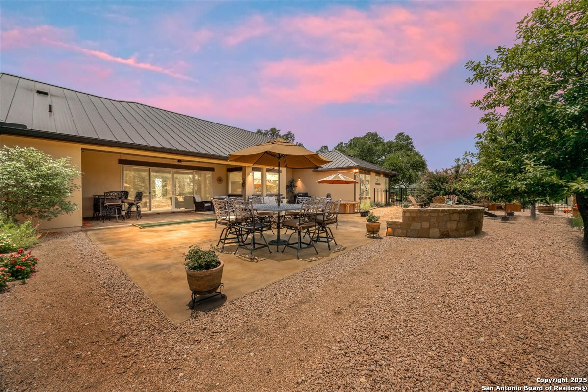 742 Pacific Spring Branch, TX 78070 - Photo 33 of 52 a swimming pool with outdoor seating and a yard
