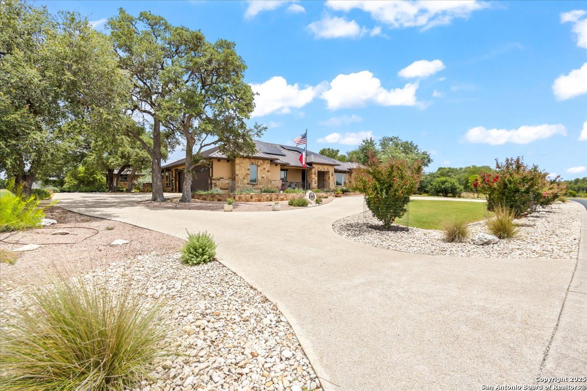 742 Pacific Spring Branch, TX 78070 - Photo 35 of 52 a view of a swimming pool with a patio