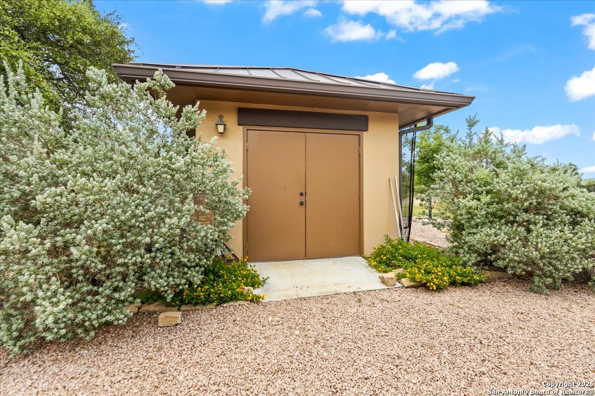 742 Pacific Spring Branch, TX 78070 - Photo 37 of 52 a front view of a house with garden