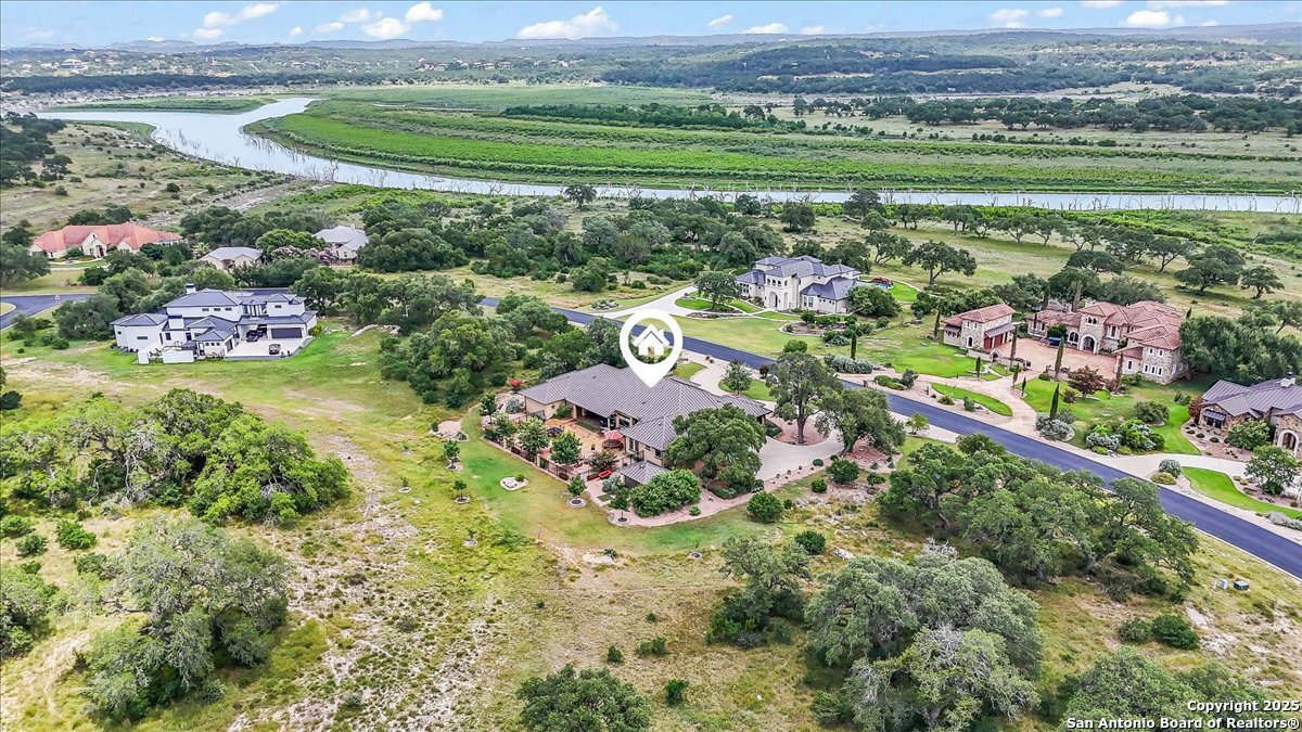742 Pacific Spring Branch, TX 78070 - Photo 44 of 52 an aerial view of a golf course with a lake view