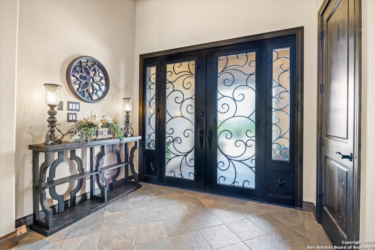 742 Pacific Spring Branch, TX 78070 - Photo 5 of 52 a view of a hallway with elevator gate