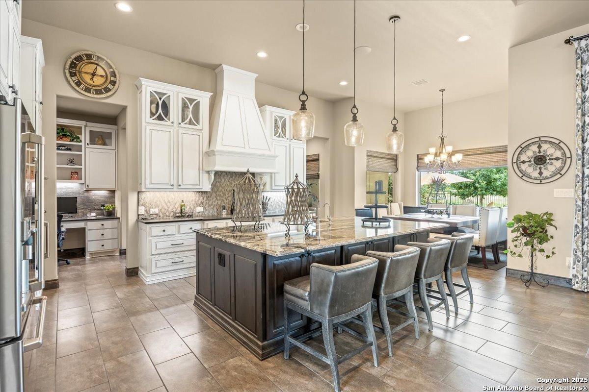 742 Pacific Spring Branch, TX 78070 - Photo 10 of 52 a large kitchen with a table and chairs in it