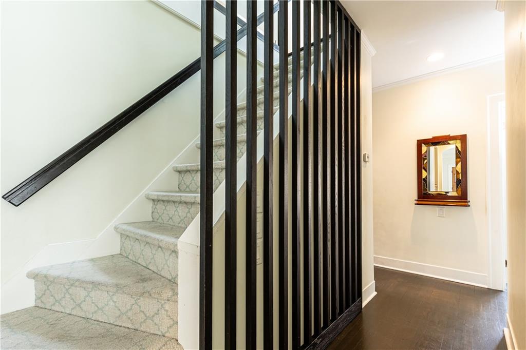 1022 Reeder Circle Northeast Atlanta, GA 30306 - Photo 17 of 37 a view of staircase with railing and white walls