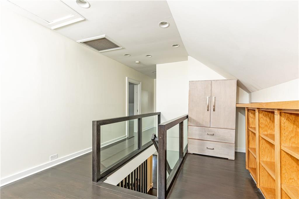 1022 Reeder Circle Northeast Atlanta, GA 30306 - Photo 20 of 37 a view of hallway with stairs and wooden floor