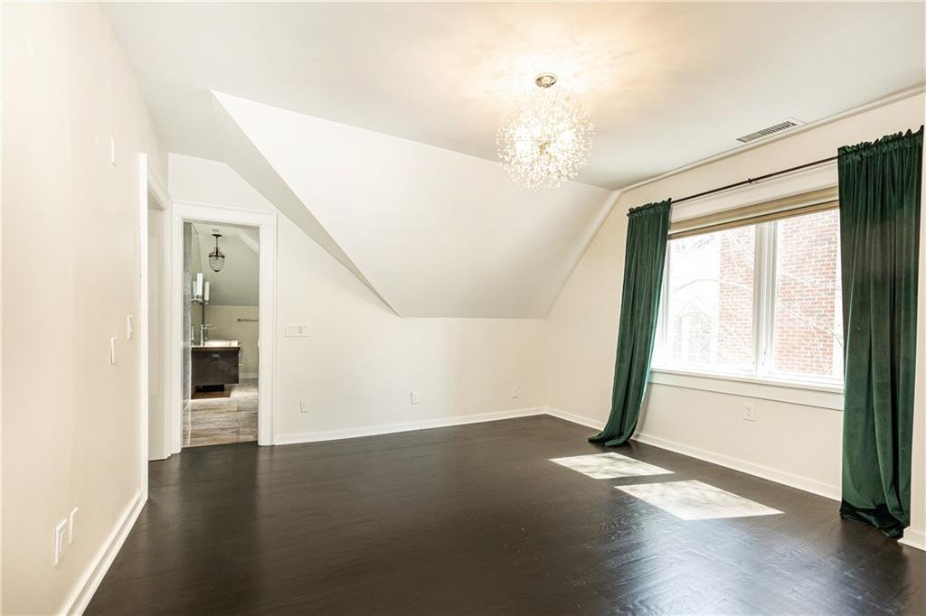 1022 Reeder Circle Northeast Atlanta, GA 30306 - Photo 21 of 37 a view of a livingroom with wooden floor and a large window