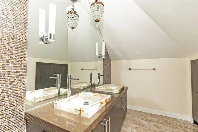 a room with a table and chairs