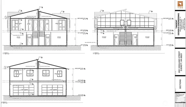 a black and white photo of a very nice looking living room