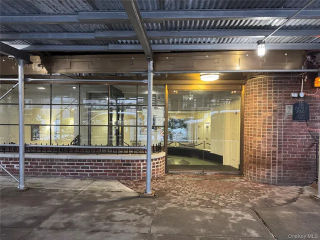 a view of a door of the house and wooden floor