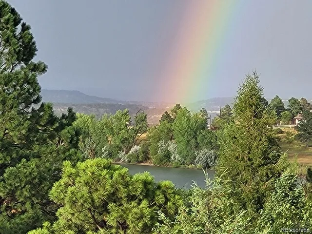 a view of a lake with a garden