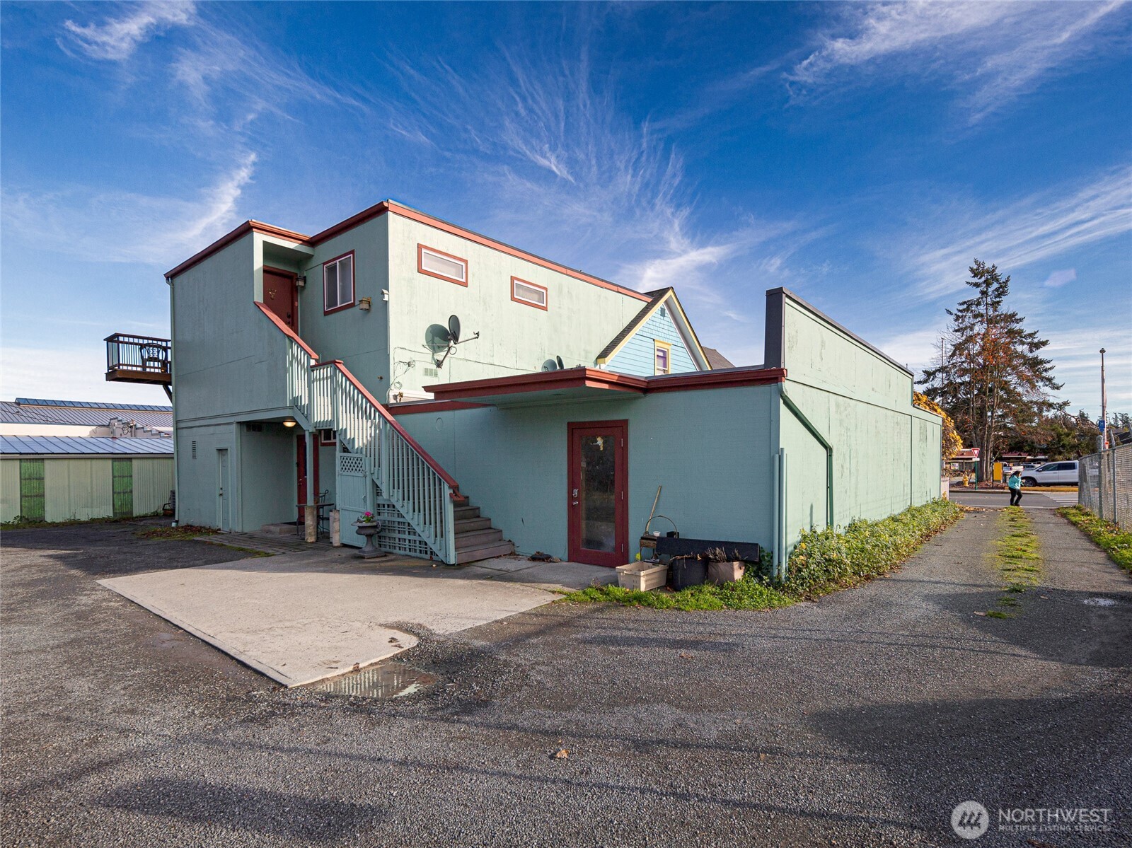 310 Spring Street, Unit F Friday Harbor, WA 98250 - Photo 17 of 20 a view of a house with a street