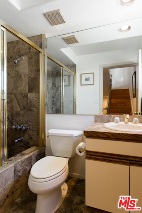 30 Lighthouse Street, Unit 1 Marina del Rey, CA 90292 - Photo 12 of 20 a bathroom with a sink a toilet and shower