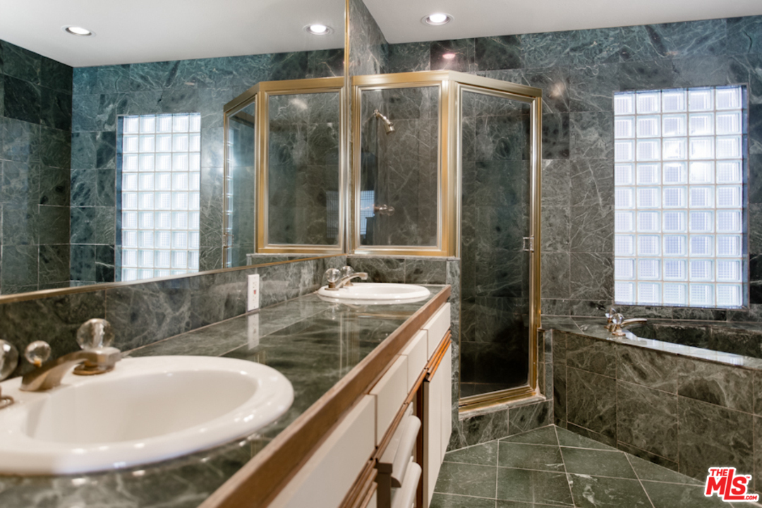 30 Lighthouse Street, Unit 1 Marina del Rey, CA 90292 - Photo 20 of 20 a bathroom with a sink and a mirror
