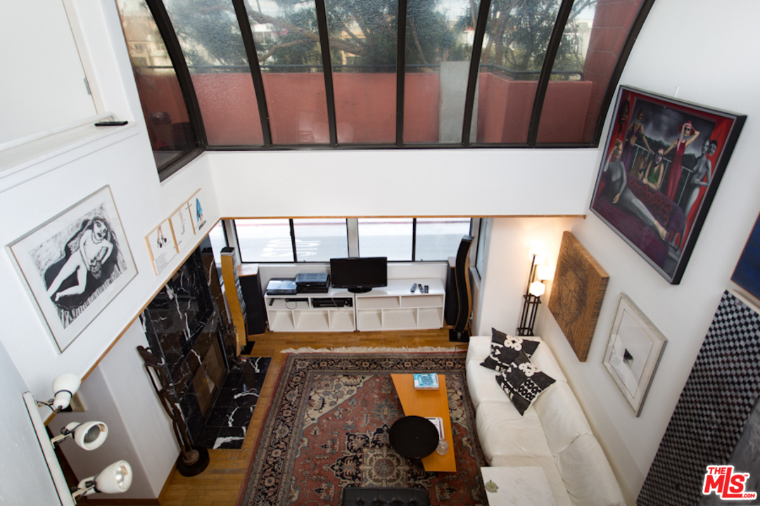 30 Lighthouse Street, Unit 1 Marina del Rey, CA 90292 - Photo 3 of 20 a view of living room with furniture and a fireplace