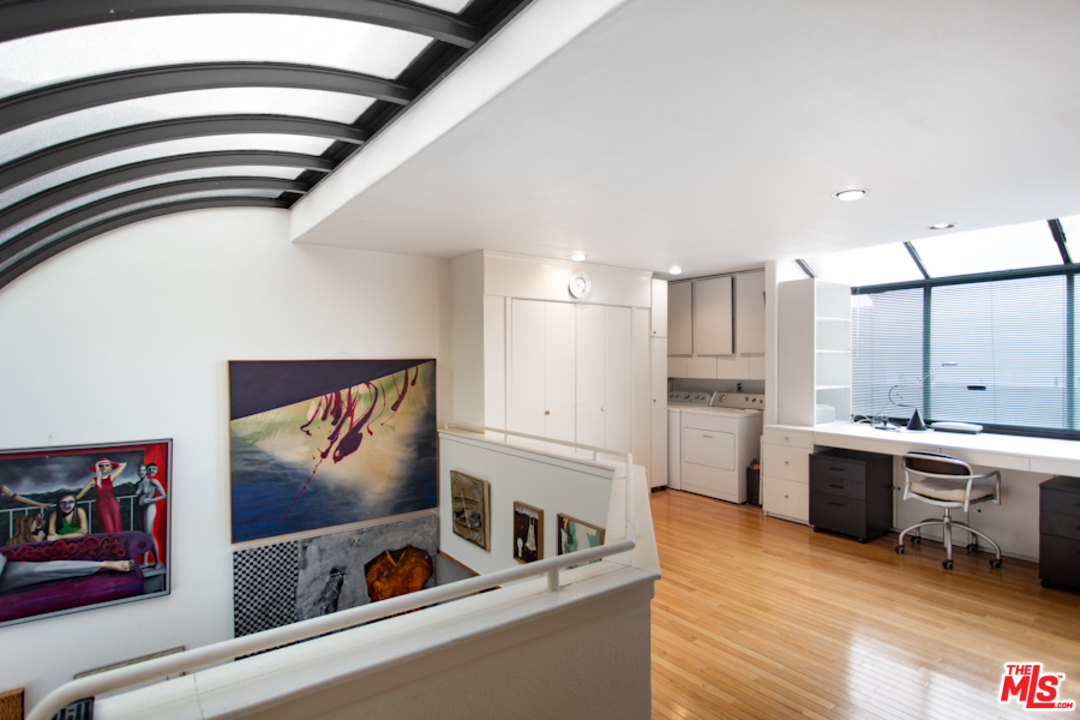 30 Lighthouse Street, Unit 1 Marina del Rey, CA 90292 - Photo 7 of 20 a living room with stainless steel appliances kitchen island granite countertop a refrigerator a stove and a sink