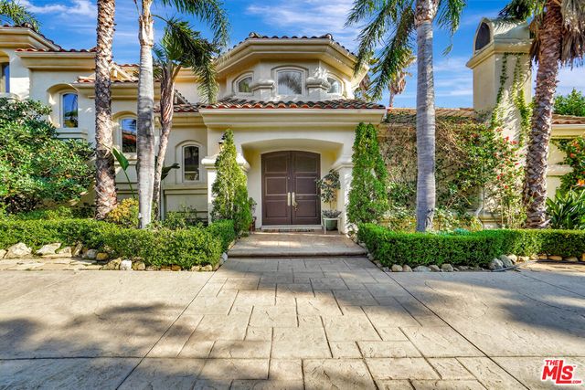 a view of a building and a garden