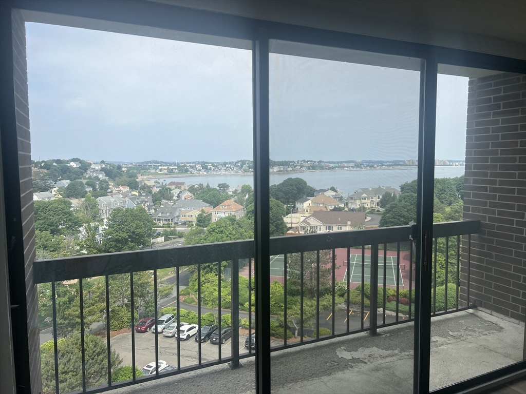 1 Pond Street, Unit 8K Winthrop, MA 02152 - Photo 3 of 14 a view of a city from a window