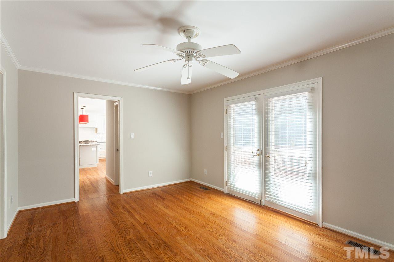 2003 Nancy Ann Drive Raleigh, NC 27607 - Photo 15 of 30 wooden floor in an empty room with a window