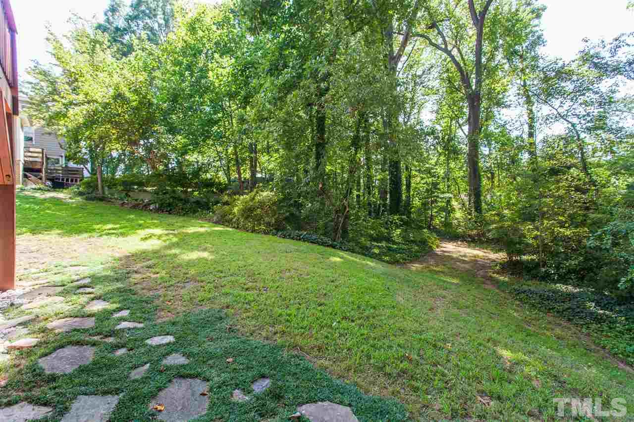 2003 Nancy Ann Drive Raleigh, NC 27607 - Photo 5 of 30 a view of a yard with a trees