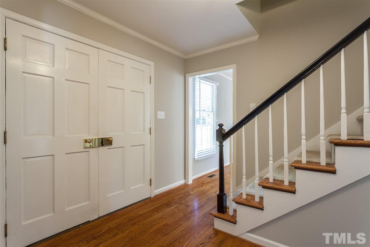 2003 Nancy Ann Drive Raleigh, NC 27607 - Photo 9 of 30 a view of an entryway with wooden floor and staircase