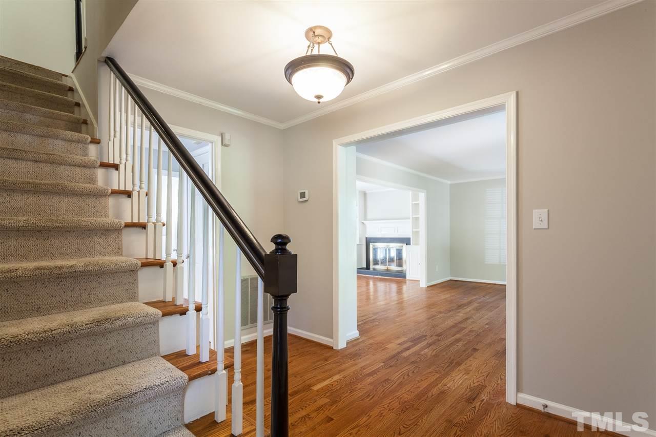 2003 Nancy Ann Drive Raleigh, NC 27607 - Photo 10 of 30 a view of entryway and hall with wooden floor