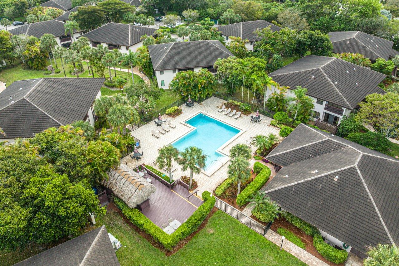 9346 Sable Ridge Circle, Unit B Boca Raton, FL 33428 - Photo 23 of 25 an aerial view of a house with a garden