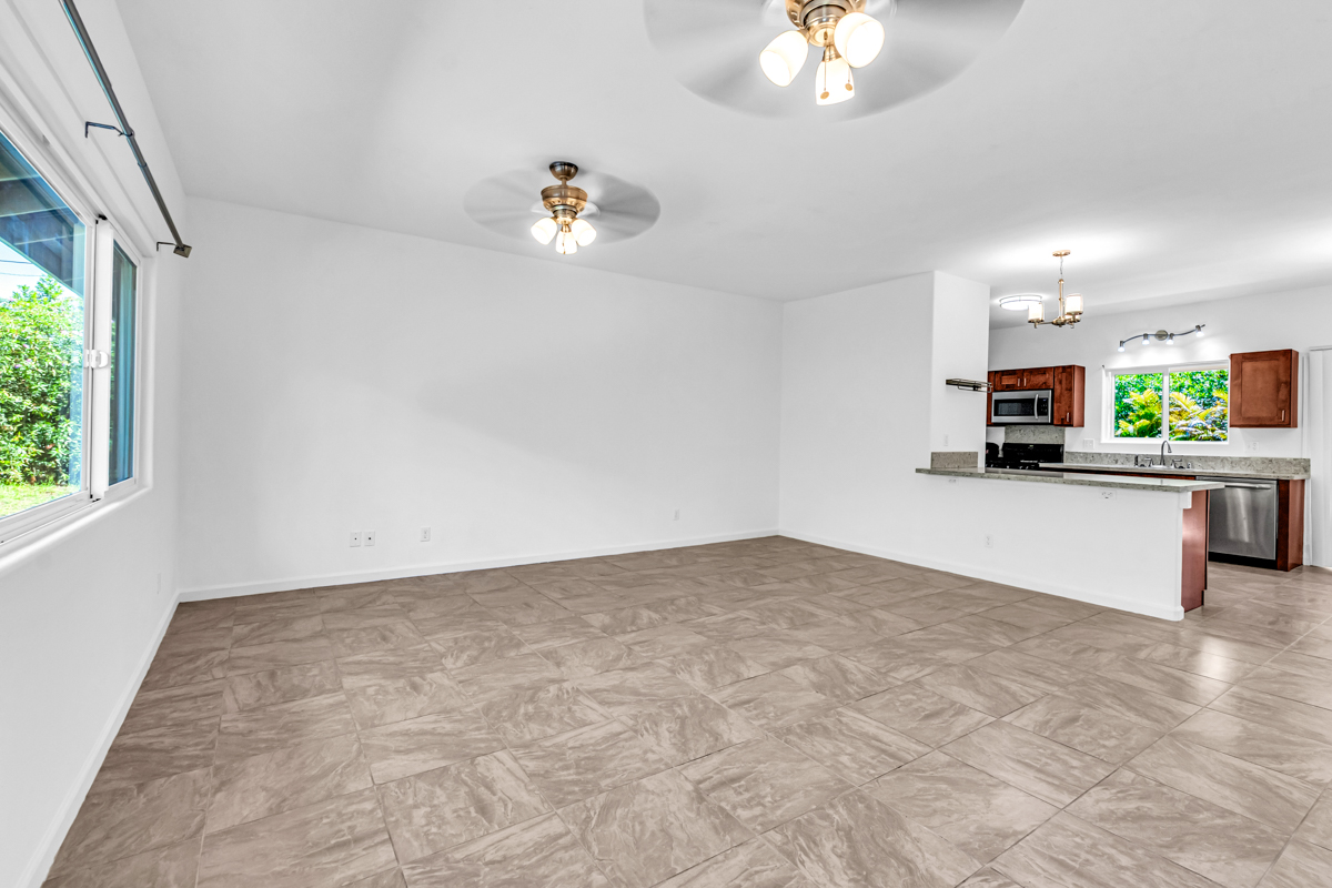 15-1136 Ama U Road Keaau, HI 96749 - Photo 11 of 25 a view of a kitchen with a sink cabinets and window