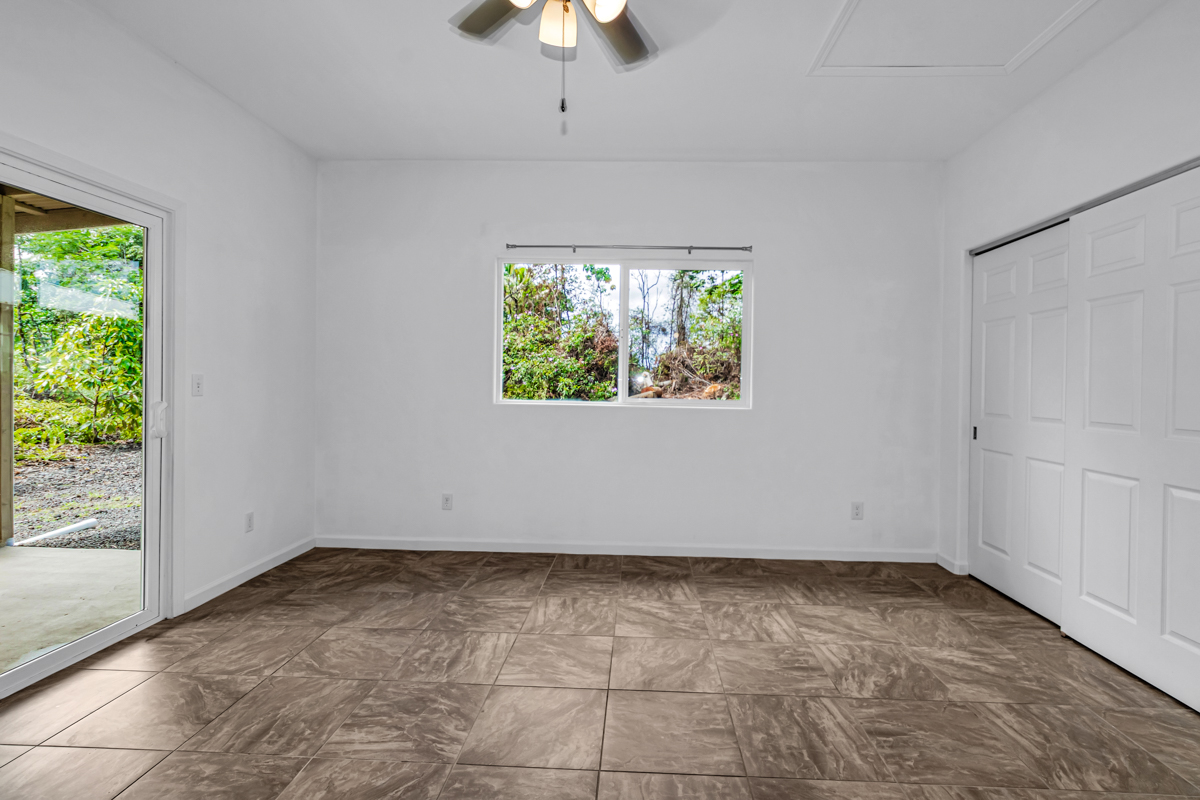 15-1136 Ama U Road Keaau, HI 96749 - Photo 14 of 25 an empty room with a window