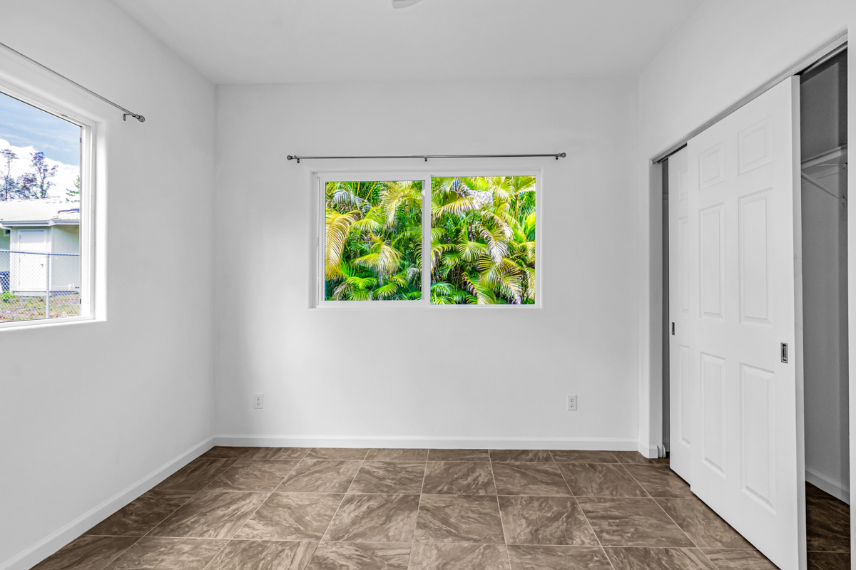15-1136 Ama U Road Keaau, HI 96749 - Photo 23 of 25 an empty room with a window